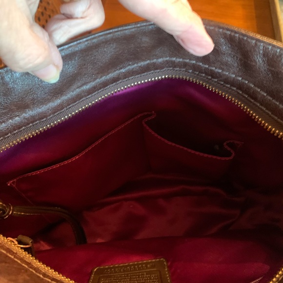 Coach Brown signature handbag, zips, GOLD hardware, Purple lining and footed. - Picture 8 of 11